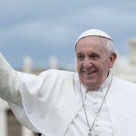 Pope Francis waves to crowd