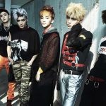 Members of the K-pop boy band NCT sport outrageous clothes and hair.