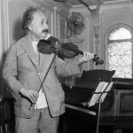 Albert Einstein playing the violin.