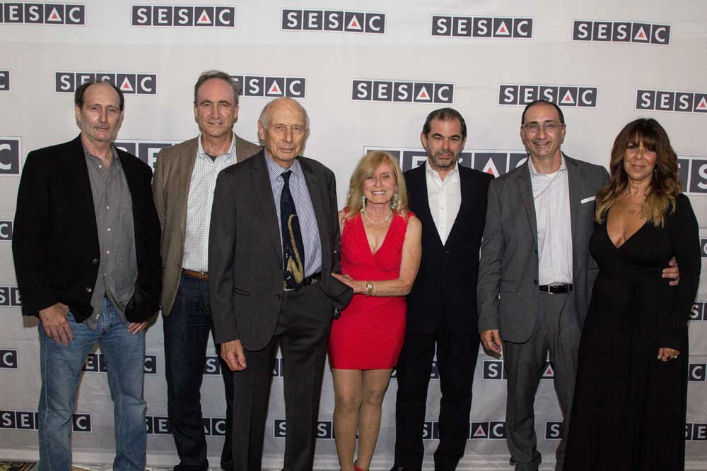 Jay Cooper and family with SESAC CEO John Josephson.