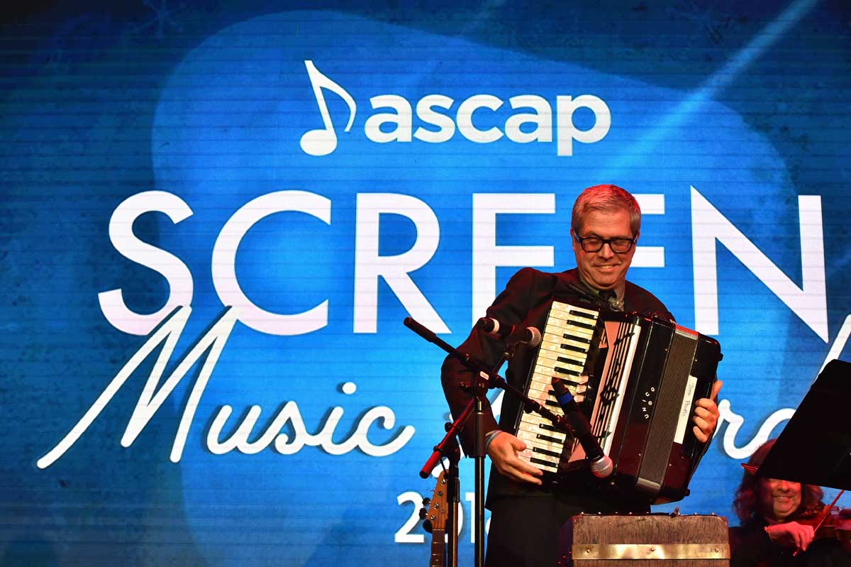 Composer John Powell plays the accordion.