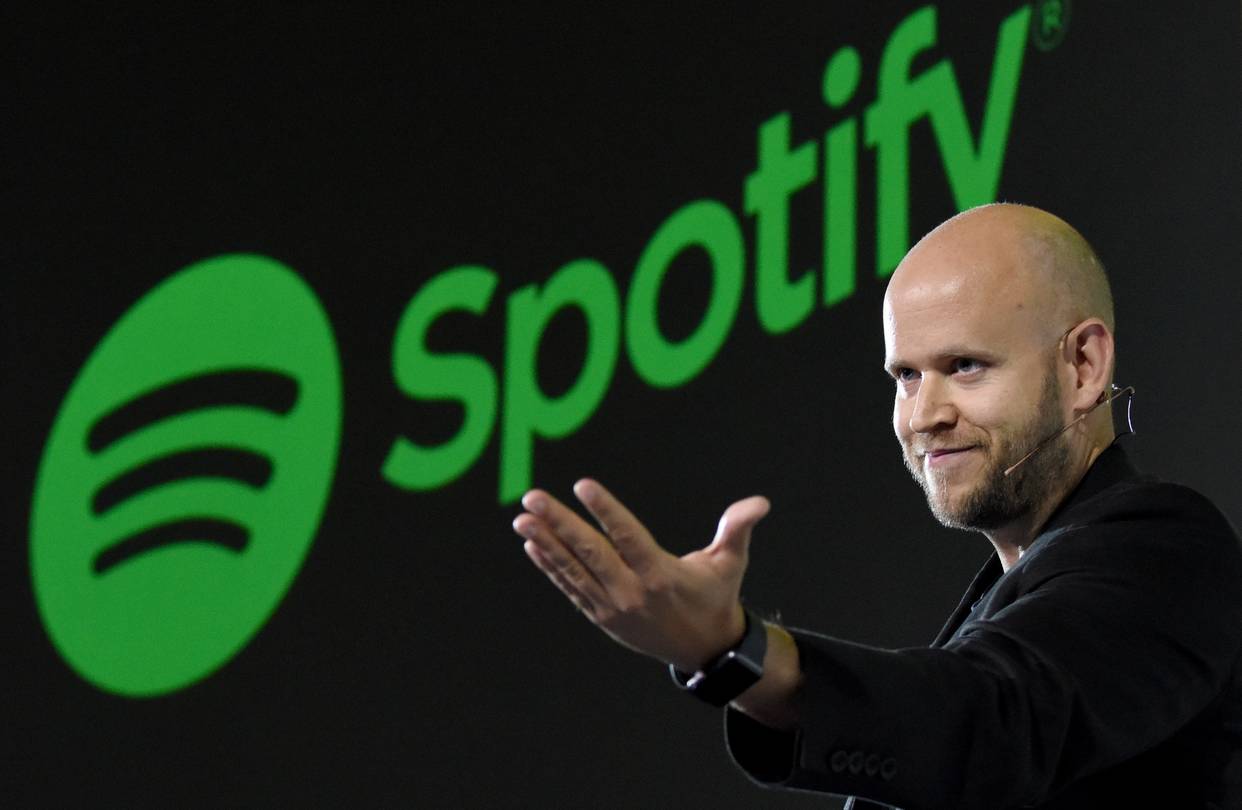 Danel Ek onstage with Spotify logo