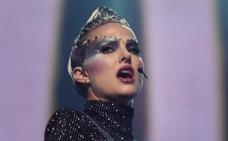 Natalie Portman goes glam with eleborate eye makeup and platinum hair in Vox Lux