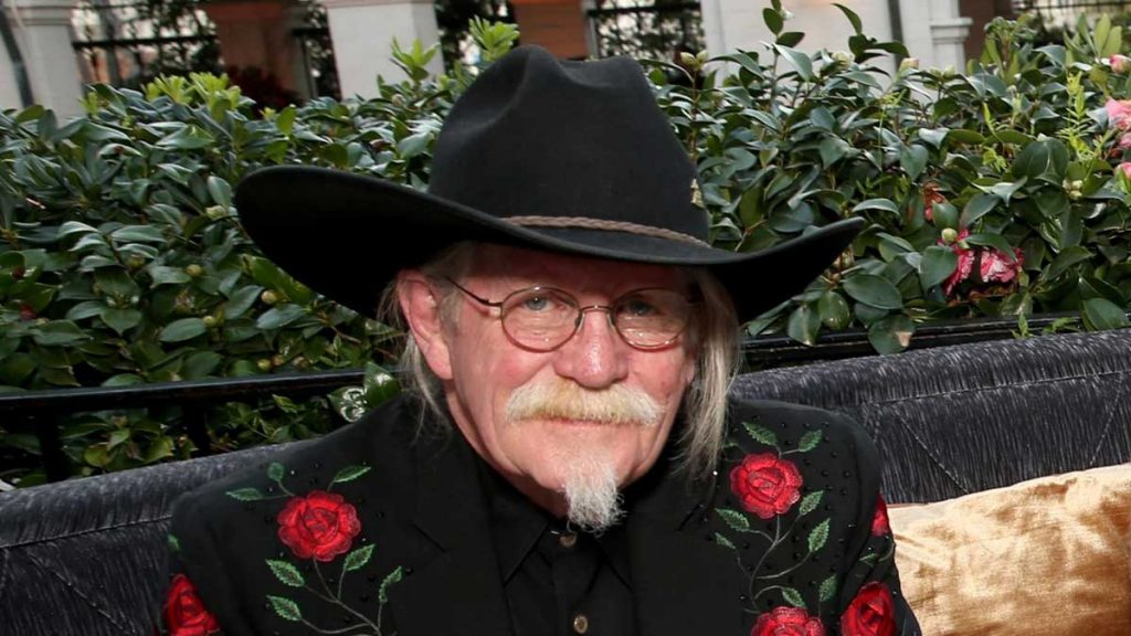 John Billings sports a black cowboy stetson.